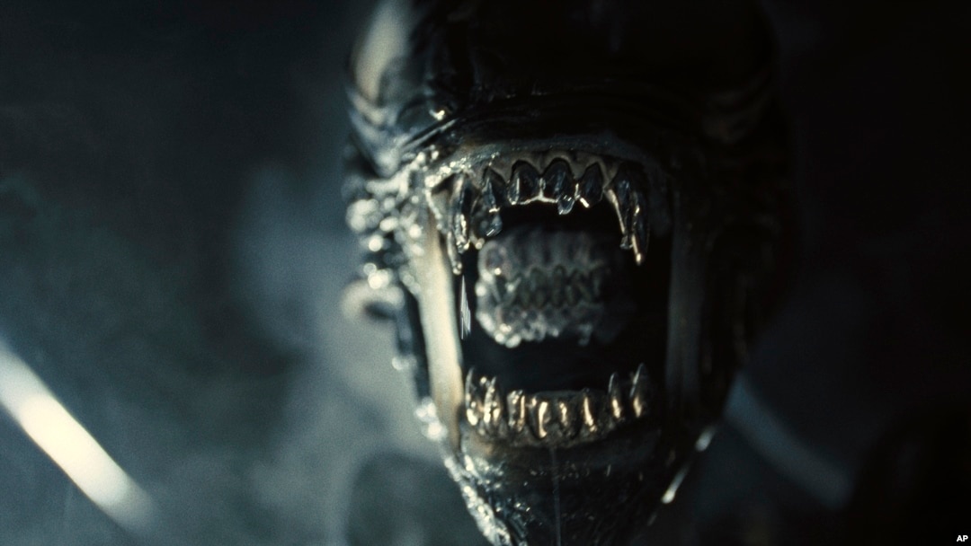 This image released by 20th Century Studios shows Xenomorph in a scene from "Alien: Romulus." (20th Century Studios via AP)