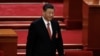 Chinese President Xi Jinping arrives for the closing session of the National People's Congress (NPC) at the Great Hall of the People in Beijing, March 11, 2024. 