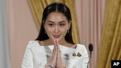 Thailand's new Prime Minister Paetongtarn Shinawatra talks to media members after receiving a royal letter of endorsement for the post at the Pheu Thai party headquarters in Bangkok, Aug. 18, 2024.