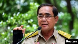 Thailand’s Prime Minister Prayuth Chan-ocha speaks to members of media at the Government House in Bangkok, March 20, 2023.