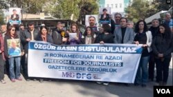 FILE - Kurdish journalists protest in Diyarbakir, Turkey, Dec. 4, 2023.
