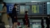 Bandara Internasional Ibu Kota Beijing di Beijing, Rabu, 26 April 2023. China tidak lagi mewajibkan hasil tes COVID-19 negatif bagi wisatawan pendatang mulai Rabu (30/8). (Foto: AFP)