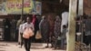 በተኩስ አቁም ወቅት ነዋሪዎች ቀለባቸውን ለመሸመት ዳቦ ቤት ተሰልፈው፤ ካርቱም፣ ሱዳን እአአ 5/27/2023 