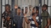 10 anti-government protesters go on trial for treason in Nigeria 