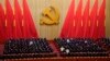 Attendees bow their heads to observe a moment of silence for fallen comrades during the opening ceremony of the 20th National Congress of China's ruling Communist Party held at the Great Hall of the People in Beijing, China, Oct. 16, 2022.