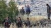 Dîmeneke şervanên Kurd yên Partîya Karkerên Kurdistanê (PKK) li Çiyayê Qendil ya li Îraqê (AP, Tebax, 2010)