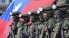台灣士兵在高雄舉行抗擊中國軍隊入侵的軍演。（2023年1月11日）
