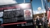 A poster displays the $10 million reward offered by the U.S. for information on terror suspect Mohamoud Abdi Aden of the 2019 Dusit D2 hotel complex attack in Nairobi, at the DCI headquarters in Nairobi, Jan. 12, 2023. 