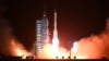 FILE - A Long March-2F carrier rocket, carrying the Shenzhou-15 spacecraft with three astronauts heading to China's Tiangong space station, lifts off from the Jiuquan Satellite Launch Center in Northwest China's Gansu Province, Nov. 29, 2022.