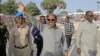FILE - Hassan Sheikh Mohamud, the president of Somalia, leads a demonstration at Banadir Stadium, Mogadishu, Jan. 12, 2023. The president announced Friday that his government has banned people from carrying weapons on the streets of Mogadishu, the country's capital.