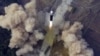 북한은 24일 김정은 국무위원장의 명령에 따라 신형 대륙간탄도미사일(ICBM) 화성 17형을 시험 발사했다며 사진을 공개했다.