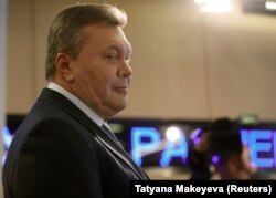RUSSIA – Viktor Yanukovych, the former president of Ukraine who was ousted by street protests and fled to Russia in 2014, arrives to attend a news conference in Moscow, February 6, 2019