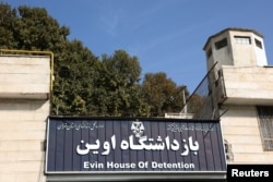 FILE - An entrance sign for Evin prison is seen in Tehran, Iran, Oct. 17, 2022. (Majid Asgaripour/West Asia News Agency via Reuters)