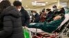New Year's Eve Spurs Hope in China Even as Censors Target Online COVID Content 