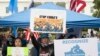 FILE - East Turkistan Awakening Movement holds a rally outside the White House against the Chinese Communist Party (CCP) to coincide with the 73rd National Day of the People's Republic of China in Washington, Oct. 1, 2022. 
