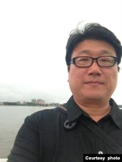 位於台北的致理科技大學國貿系副教授張弘遠 (照片提供:張弘遠)