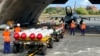 Rudal antikapal Harpoon A-84 milik AS, serta rudal udara-ke-udara AIM-120 dan AIM-9 berada di depan jet tempur F-16V milik AS di Pangkalan Udara Hualien di wilayah Hualien, Taiwan tenggara, 17 Agustus 2022. (Foto: AP)