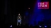 U.S. Senate Democratic candidate Tim Ryan speaks at a campaign event featuring a performance by Dave Matthews in Columbus, Ohio, Oct. 24, 2022. Both Democratic and Republican candidates are pledging tough policies on China in hopes of wooing voters.