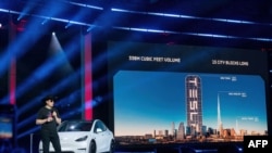 Tesla Motors CEO Elon Musk speaks at the company's Giga Texas manufacturing "Cyber Rodeo" grand opening party on April 7, 2022 in Austin, Texas. Tesla welcomed throngs of electric car lovers to Texas on April 7 for a huge party inaugurating its massive n