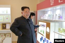 FILE PHOTO: North Korean leader Kim Jong Un visits a cosmetics factory in this undated photo released by North Korea's Korean Central News Agency (KCNA) in Pyongyang on October 28, 2017.