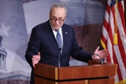 Minority Leader Charles Schumer (D-NY) talks to reporters on April 21, 2020, in Washington.