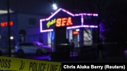 Crime scene tape surrounds Gold Spa after deadly shootings at a massage parlor and two day spas in the Atlanta area, in Atlanta, Georgia, U.S. March 16, 2021. REUTERS/Chris Aluka Berry