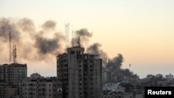 Dim u vazduhu posle izraelskih napada tokom sukoba Izraela i palestinske islamističke grupe Hamas u gradu Gazi, 7. novembra 2023. (Foto: Rojters/Mohammed Al-Masri)