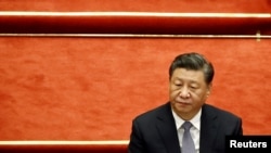 中國領導人習近平在北京人大會堂舉行的全國政協十三屆五次會議開幕式上。（2022年3月4日）