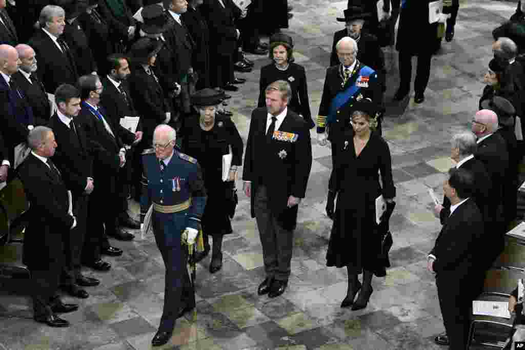 Beatrix of the Netherlands, King Willem-Alexander of the Netherlands, Queen Maxima of the Netherlands, Queen Silvia of Sweden, Carl XVI Gustaf, King of Sweden and Queen Margrethe II of Denmark depart, after the State Funeral of Queen Elizabeth II, at Westminster Abbey, in London, Monday Sept. 19, 2022. The Queen, who died aged 96 on Sept. 8, will be buried at Windsor alongside her late husband, Prince Philip, who died last year. (Gareth Cattermole/Pool Photo via AP)