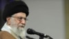 FILE - The official website of the office of the Iranian supreme leader released this photo of Supreme Leader Ayatollah Ali Khamenei meeting with a group of Iranians in a mosque at his residence in Tehran, Jan. 9, 2018.