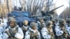Ukrainian armed forces simulate an urban crisis in the abandoned city of Pripyat near the Chernobyl nuclear plant, Ukraine, Feb. 4, 2022. 