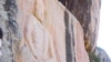 Italian Archeologists Restore Damaged Buddha Statue in Pakistan