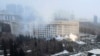 Smoke rises from the city hall building during a protest in Almaty, Kazakhstan, Jan. 5, 2022.