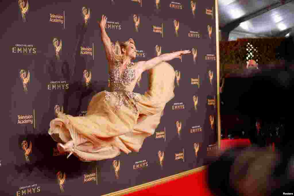 Jessie Graff from "American Ninja Warrior" poses for photographers at the 2017 Creative Arts Emmy Awards in Los Angeles, California, Sept. 9, 2017.