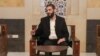Syria's new leader says all weapons to come under 'state control'