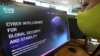 Seorang perempuan memeriksa situs web spyware Pegasus buatan Israel di sebuah kantor di ibu kota Siprus, Nicosia, 21 Juli 2021. (Foto: AFP)