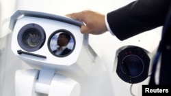 A CCTV camera is seen at the stall of video surveillance product maker Dahua Technology at the Security China 2018 exhibition in Beijing, Oct. 23, 2018. Myanmar’s junta government is installing more cameras with facial recognition capabilities.