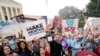 A celebration outside the Supreme Court, Friday, June 24, 2022, in Washington. The Supreme Court has ended constitutional protections for abortion that had been in place nearly 50 years — a decision by its conservative majority to overturn the court's lan