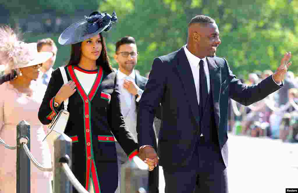 Idris Elba and Sabrina Dhowre arrive at St George's Chapel at Windsor Castle for the wedding of Meghan Markle and Prince Harry in Windsor, Britain, May 19, 2018.