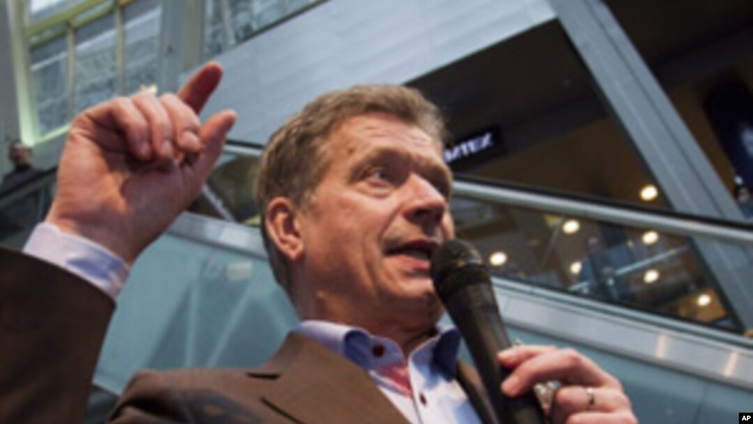 Sauli Niinisto the National Coalition party candidate for the Finnish presidential election campaigns in Helsinki on Saturday Feb. 4, 2012.