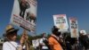 Activists march at the site of the Convention on International Trade in Endangered Species of Wild Fauna and Flora (CITES) in Johannesburg, South Africa, Sept 24, 2016. 