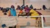 Deslocadas em Pemba. Foto: AFP