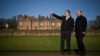 Britain's Prime Minister Keir Starmer, left, speaks with Germany's Chancellor Olaf Scholz in the garden of the Chequers, in Aylesbury, England, Feb. 2, 2025.