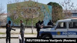 Montenegro, Podgorica, Police checks a man after the government tightens up measures for coronavirus 