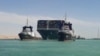 Egypt, Suez Canal, Ship Ever Given, one of the world's largest container ships, is seen after it was fully floated
