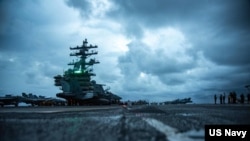 在南海執行例行任務的美國海軍羅納德.雷根號（USS Ronald Reagan）航空母艦。 （2021年6月14日）