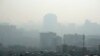 FILE - Iran is facing closures because of cold weather, energy shortages and severe air pollution.