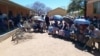 Voters queue outside a polling station in Thamaga, Botswana, west of Gaborone, on Oct. 30, 2024.