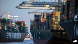 FILE - Container ships are seen at the Port of Savannah, Georgia, Sept. 29, 2021.