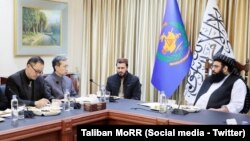 په کال کې د چین سفر د طالبانو د کډوالو چارو له وزیر مولوي عبدالکبیر سره.